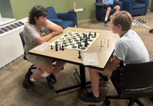 Two JBA students playing chess